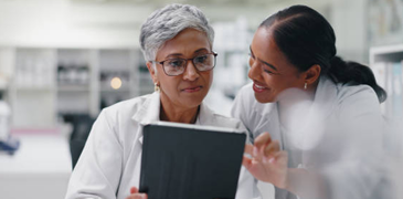 Science research and team of women with tablet for medical study results.png